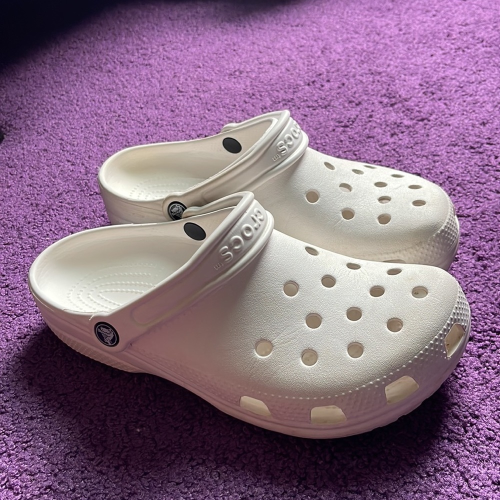White unisex crocs. Women size 9. Men size 7.